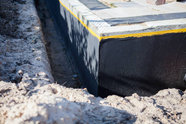 Professional Basement Waterproofing technician working in Kimberly, WI